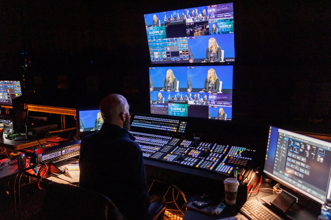 Event production team managing a live hybrid event from the control room