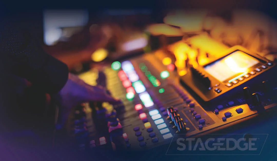 Audio and lighting equipment staged before a corporate event load-in