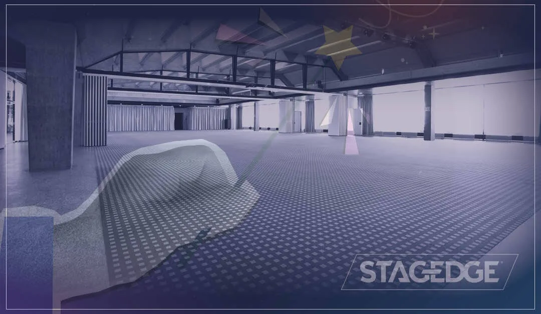 Production team walking an empty event venue during a site visit