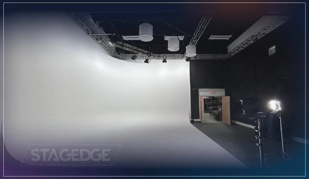 Video production studio with cameras, lighting, and backdrop set for a shoot