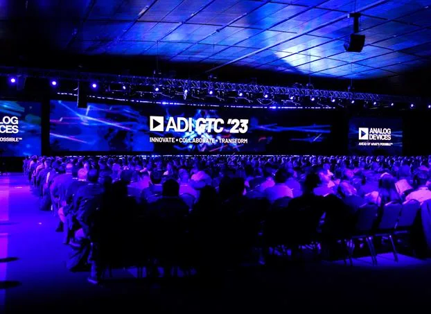 Stage production and audience at the Analog Devices General Technical Conference in 2023