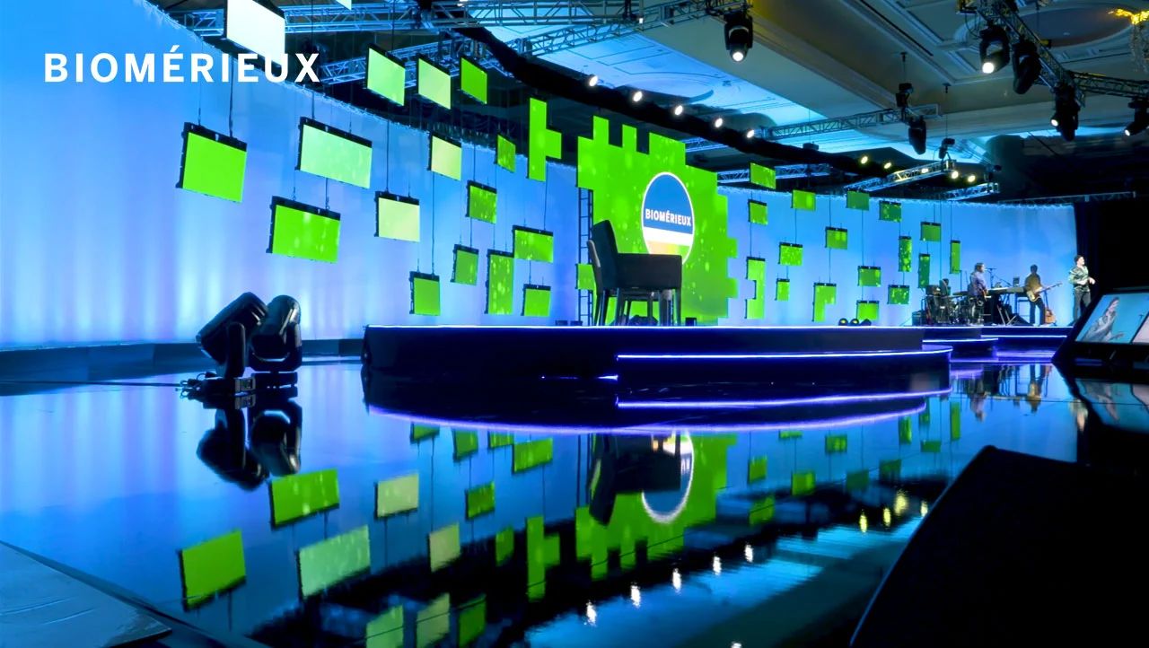 Conference stage set with branded screens at the bioMerieux international sales meeting